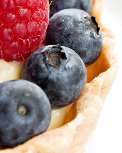 Raspberries and blueberries on a tart